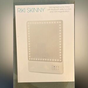 riki skinny mini lighted mirror with bluetooth 10x
NEW IN BOX